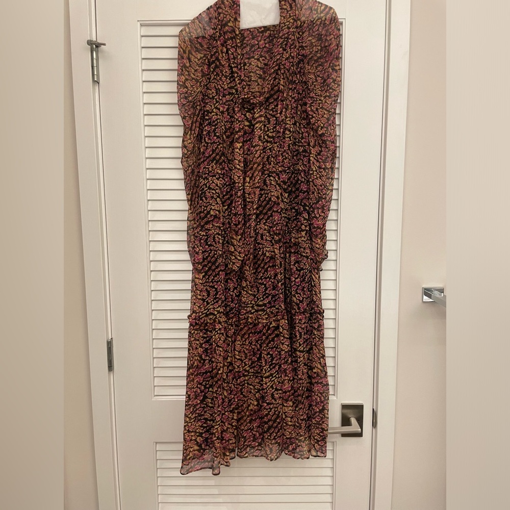 Ulla Johnson Midi animal print dress. Sheer puff sleeves and flattering fit.